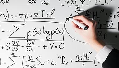 Man writing complex math formulas on whiteboard. Mathematics and science with economics concept. Real equations, symbols