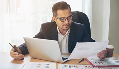 Business man busy standing at office desk on documents working , business concept