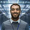 Portrait of a technician standing in a server room
