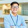 Portrait of a male technician standing in an office
