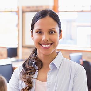 Portrait of a female teacher in a computer classroom